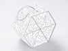 White geometric card box with cut-out patterns on a light gray background