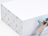 Heffalump FAB Sides® Featured on White Gift Box with Nile Blue and Tan Double Ribbon