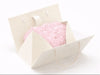 Powder Pink Tissue Paper inside an Ivory Boxbag on a white background