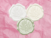 White, Sage Green and Ivory Wax Seals Featured on Rose Pink Tissue Paper