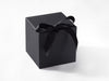 Black softbox large gift box with a ribbon on a white background