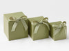 Three Sage green Softbox gift boxes various sizes with ribbons on a white background
