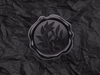 Black Wax Seal Featured on Black Tissue Paper