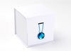 Blue Tourmaline Gemstone Gift Box Closure on Large White Cube