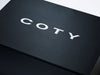 Black Folding Gift Box with Custom Printed White Coty Logo to Lid
