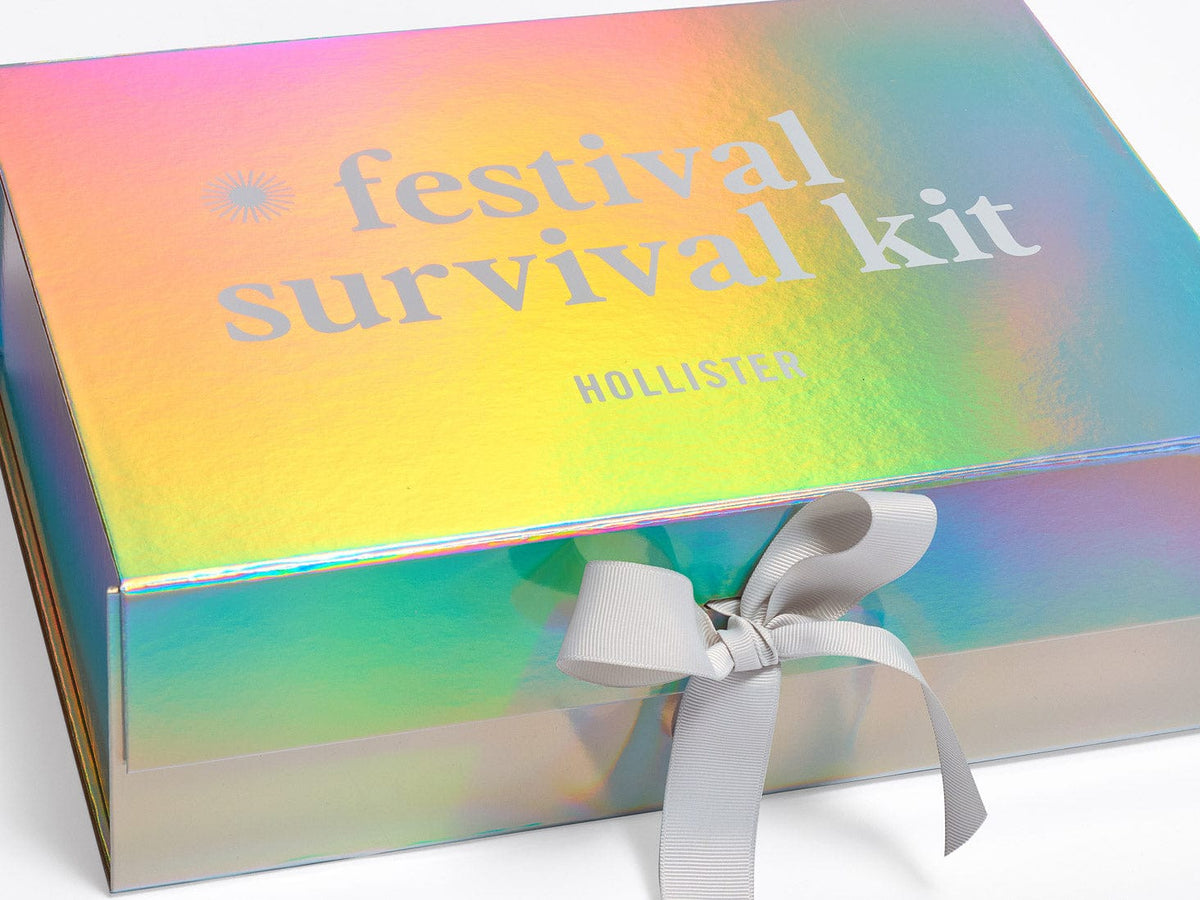 Holographic Rainbow A4 Deep Gift Box with 'festival survival kit’ Screen printed with a white bow on a white background