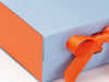 Sample Orange FAB Sides® Featured on Pale Blue Gift Box