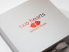 Custom Red Foil Logo Featured on Silver Gift Box