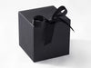 Black XL Cube softbox gift box with a black ribbon on a white background