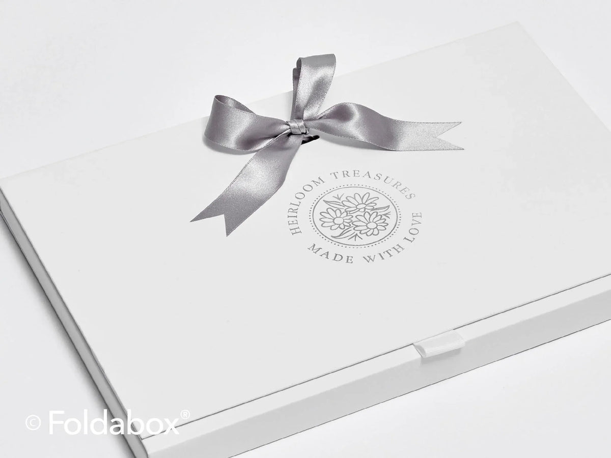 Silver Foiled Heirloom Treasures logo on Docubox with Satin Silver ribbon