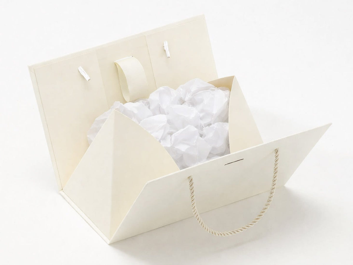 Ivory Boxbag with White scrunched tissuer paper inside on a white background