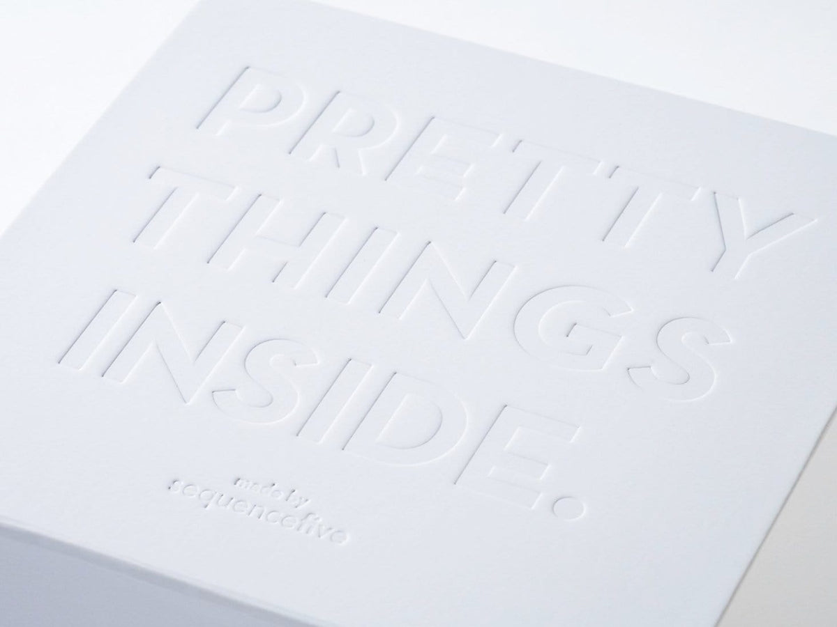 Custom Debossed Logo to Lid of White Folding Gift Box