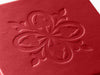 Custom Debossed logo onto lid of red folding gift box