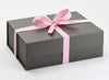 Rose Pink Grosgrain Ribbon Traditionally Tied Around Naked Grey Gift Box