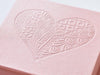 Example of rose gold gift box with debossed heart design