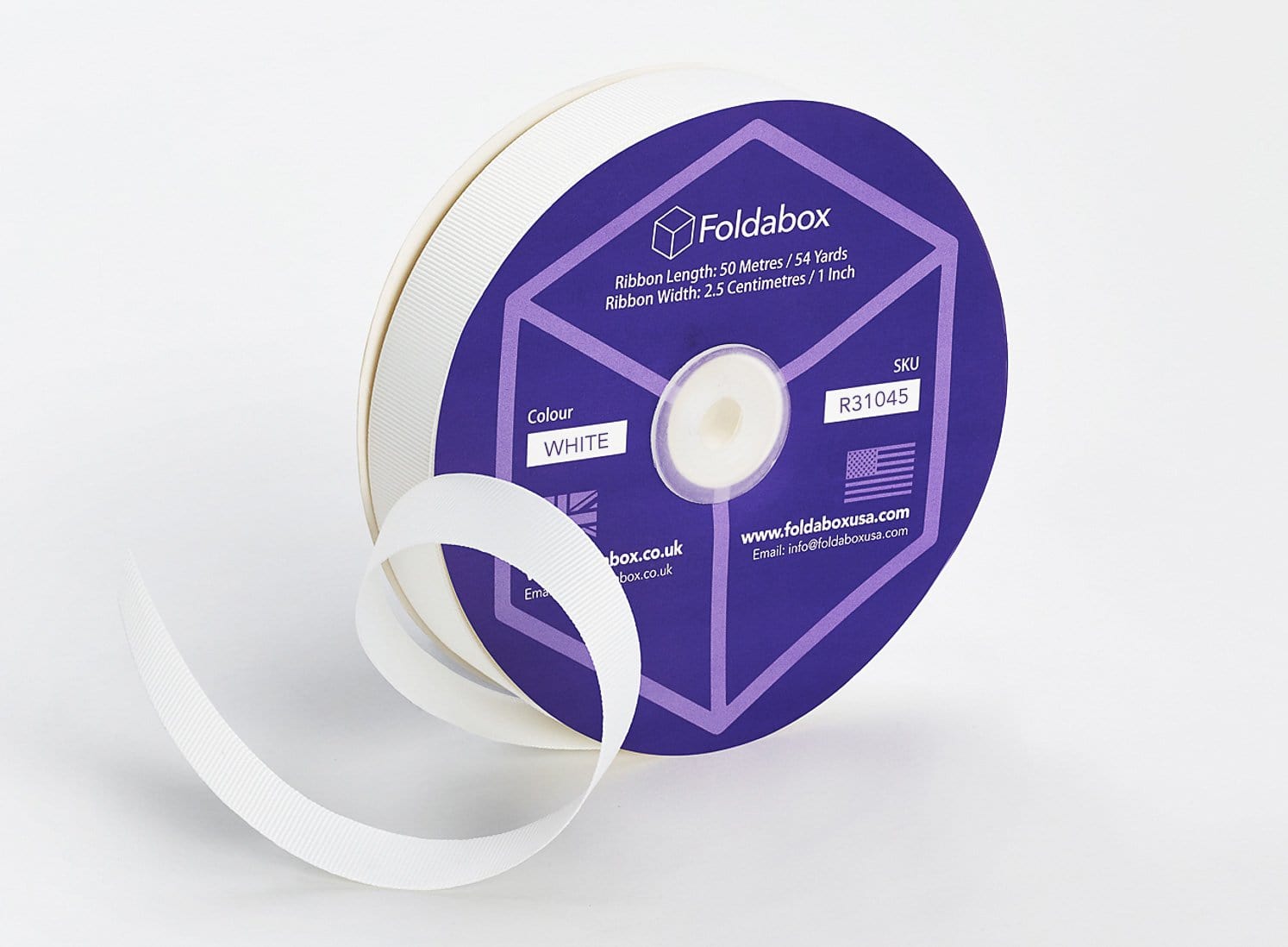 White grosgrain ribbon roll for traditional gift wrapping of folding gift boxes