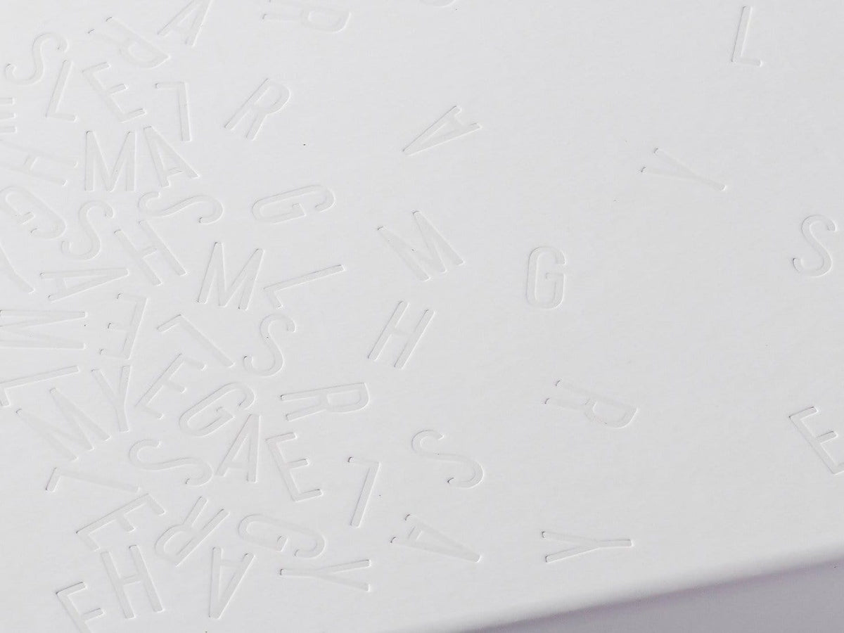 White Gift Box with Custom Debossed Design to Lid